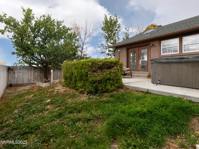 a big yard with large trees