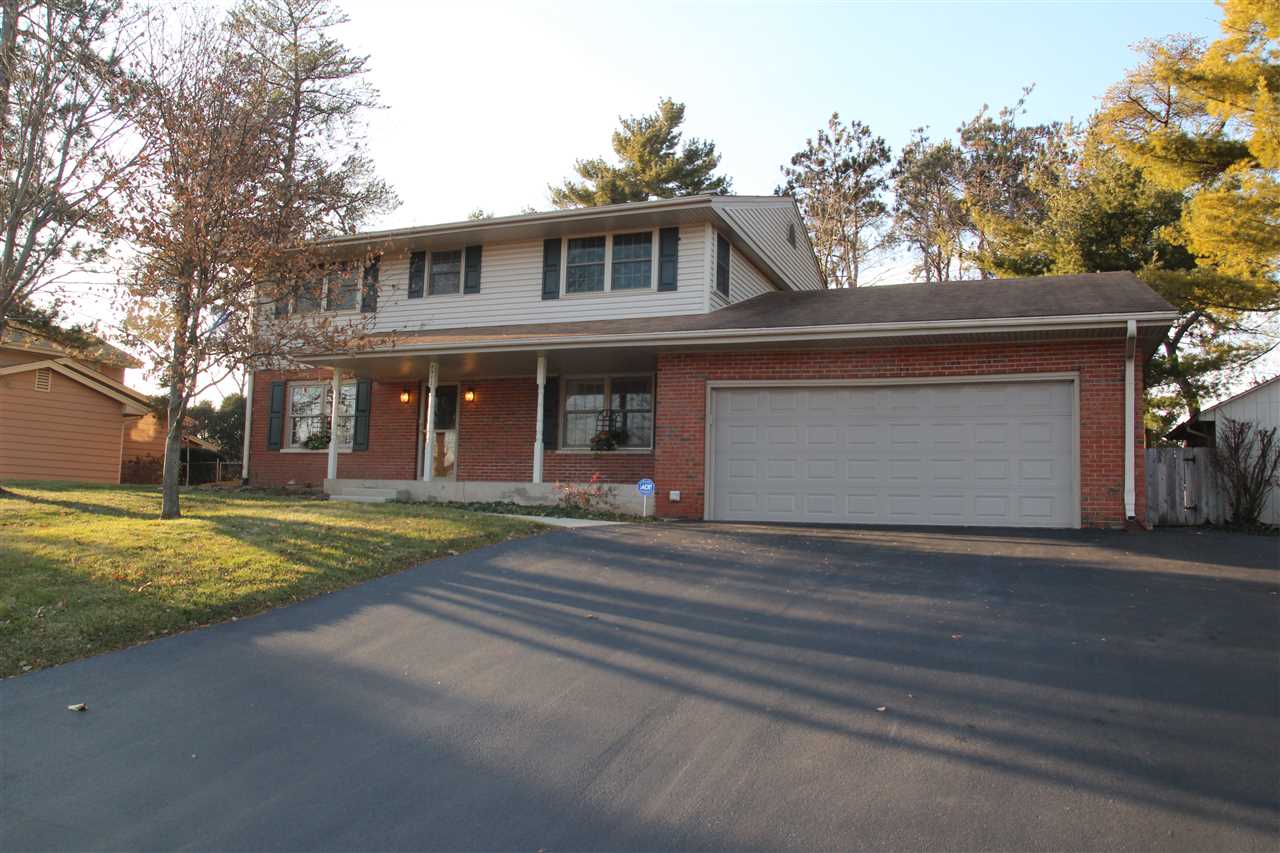 4972 Brookview Road Rockford, IL 61107 - Photo 1 of 22 front view of a house with a yard