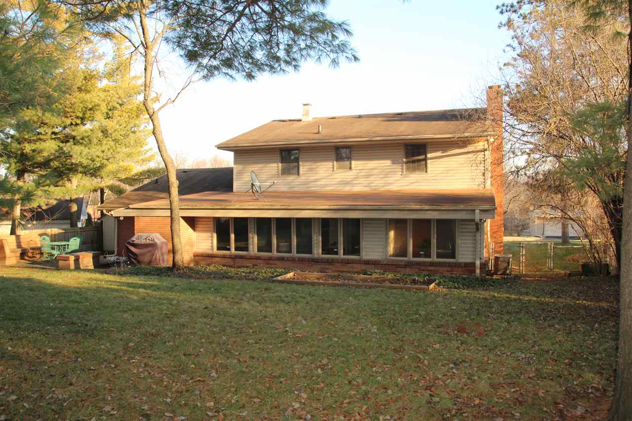 4972 Brookview Road Rockford, IL 61107 - Photo 20 of 22 a front view of house with yard