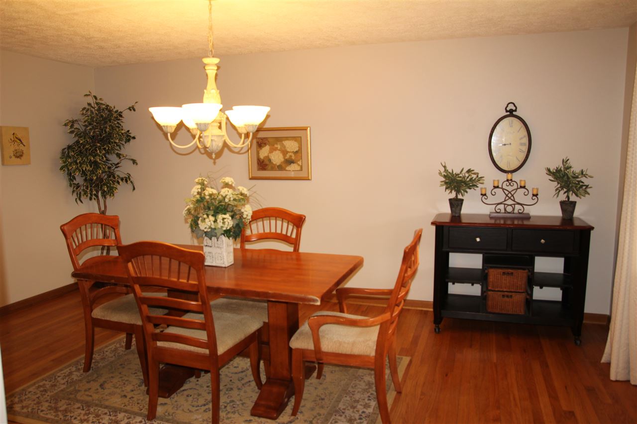 4972 Brookview Road Rockford, IL 61107 - Photo 3 of 22 a dining room with furniture and wooden floor
