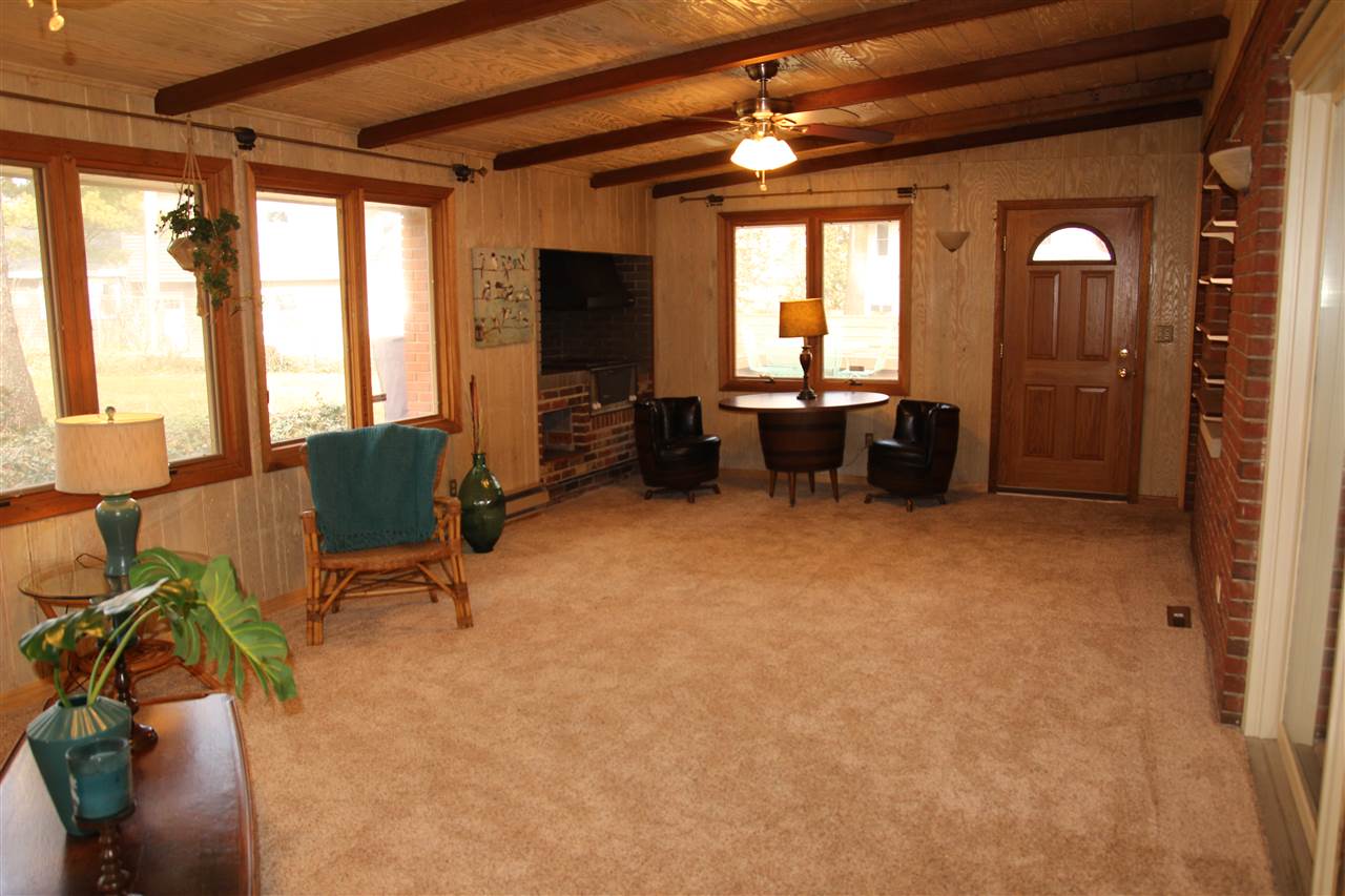 4972 Brookview Road Rockford, IL 61107 - Photo 8 of 22 a view of a livingroom with couch and windows