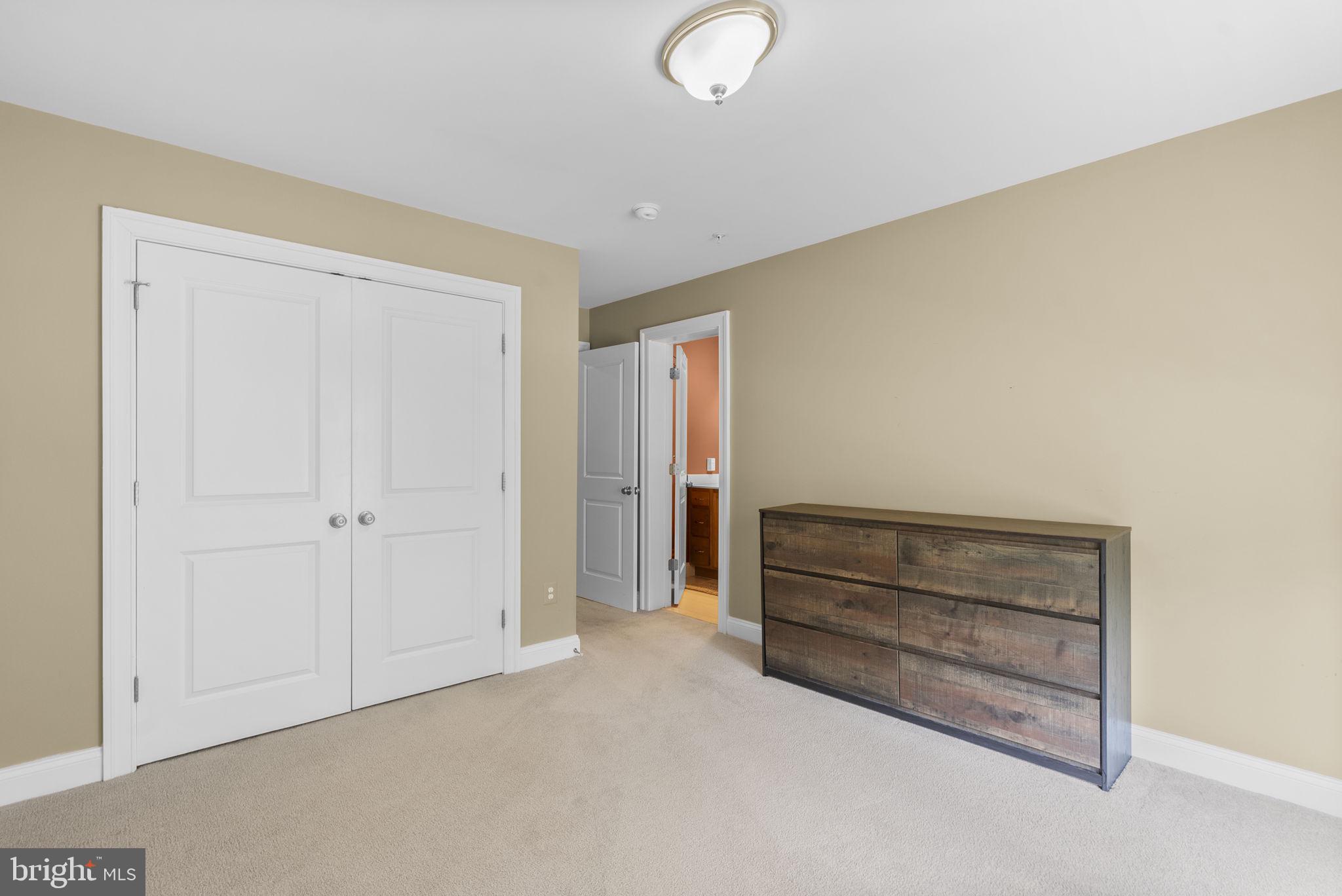4702 Edgefield Road Bethesda, MD 20814 - Photo 38 of 58 Spacious room with neutral tones.