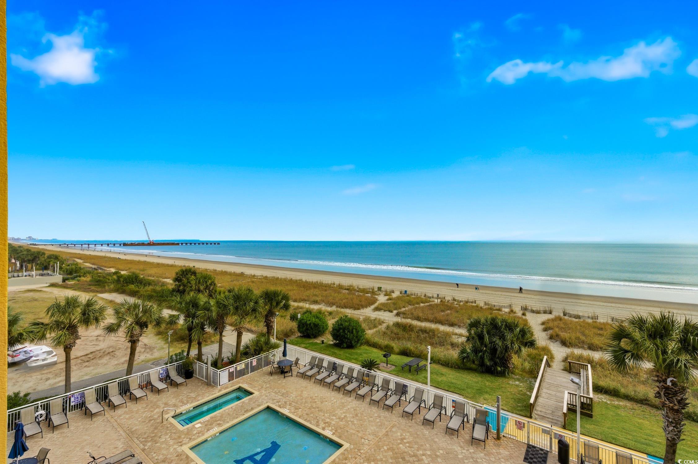1702 North Ocean Boulevard, Unit 355 Myrtle Beach, SC 29577 - Photo 14 of 27 Bird's eye view of unending shoreline and a pool area