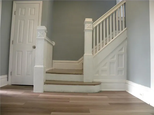 a view of entryway with wooden floor