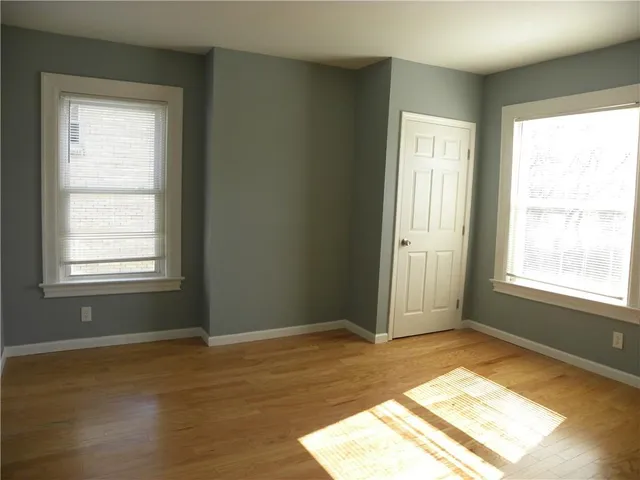 a view of an empty room and window