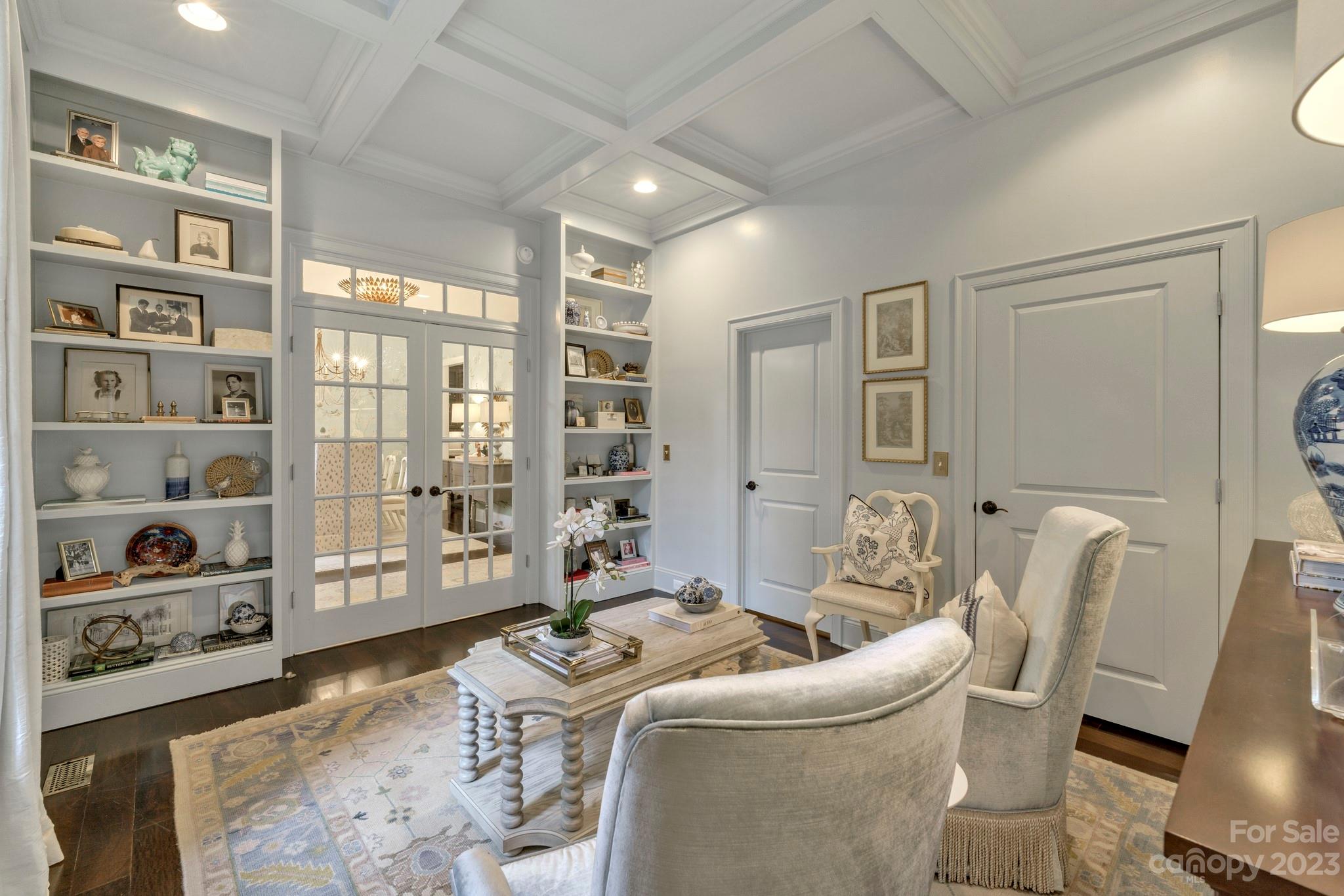 407 Bullfinch Bend Fort Mill, SC 29708 - Photo 11 of 46 a living room with furniture and a book shelf