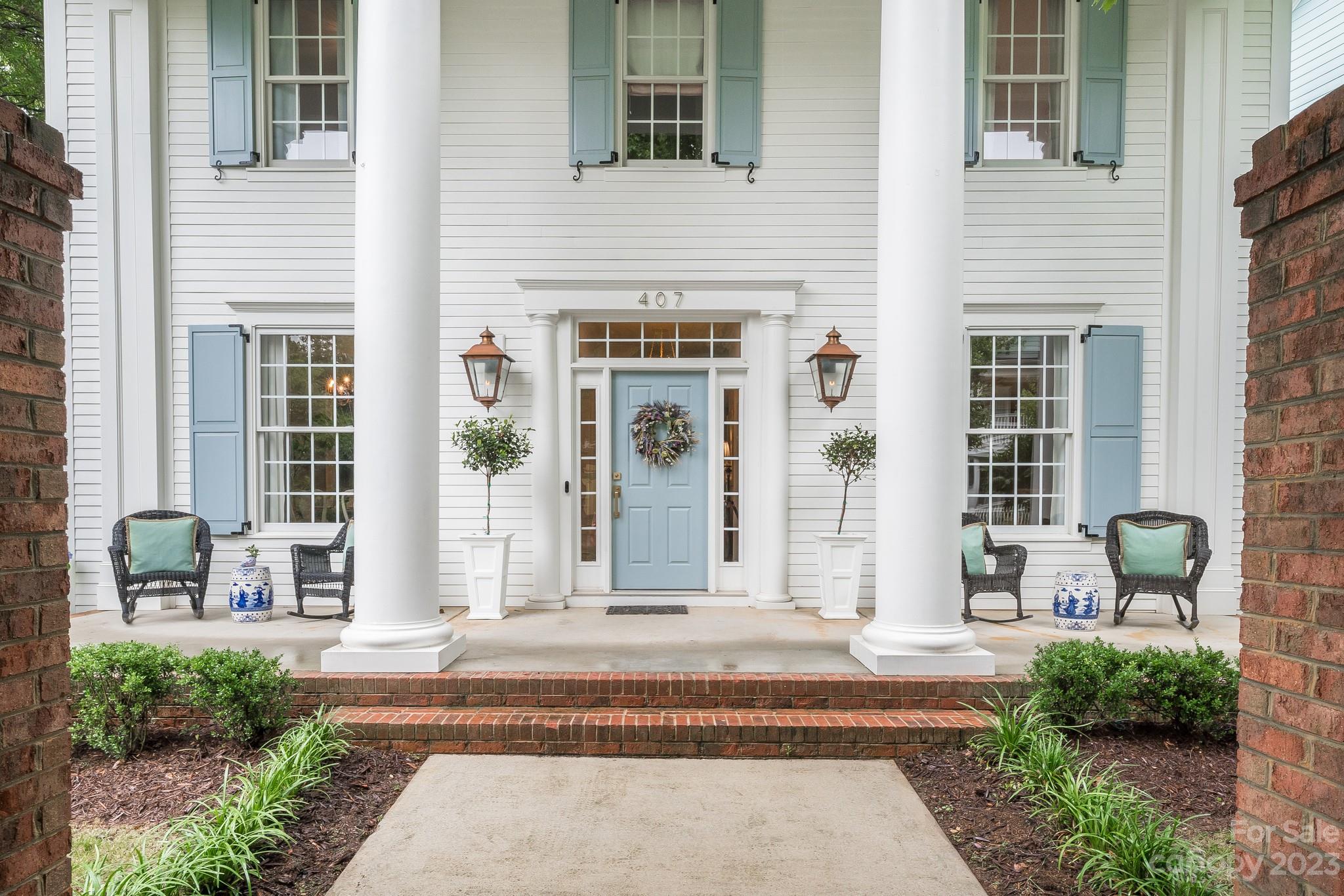 407 Bullfinch Bend Fort Mill, SC 29708 - Photo 2 of 46 a front view of a house with a yard