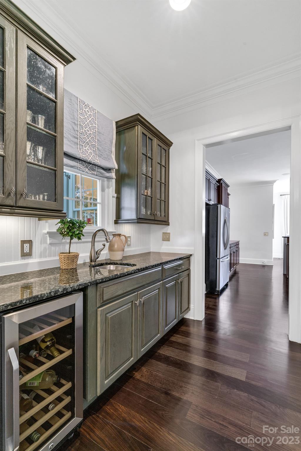 407 Bullfinch Bend Fort Mill, SC 29708 - Photo 25 of 46 a large kitchen with granite countertop a stove and sink