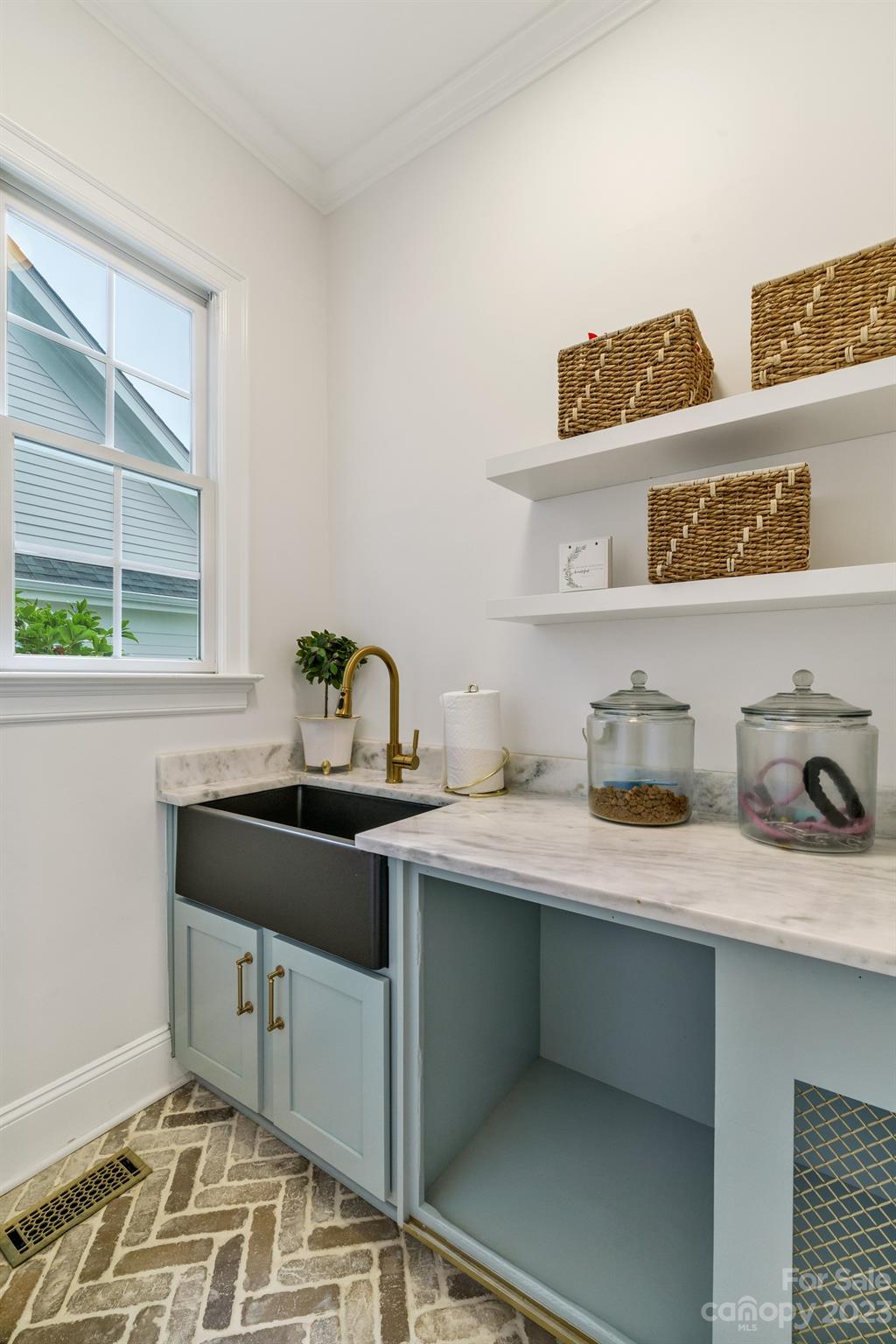 407 Bullfinch Bend Fort Mill, SC 29708 - Photo 26 of 46 a room with a sink and cabinets