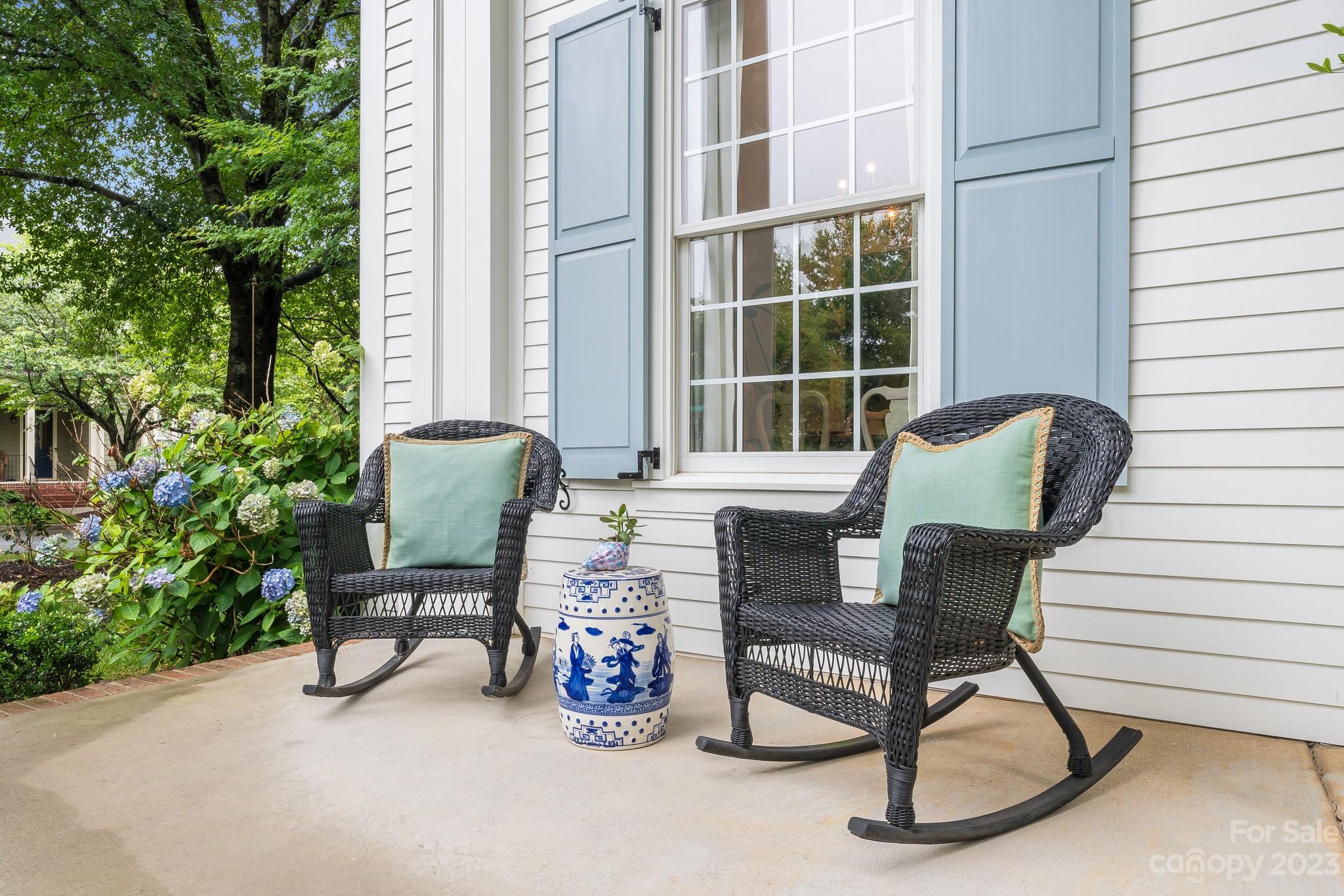 407 Bullfinch Bend Fort Mill, SC 29708 - Photo 3 of 46 a view of a work space with furniture and a potted plant