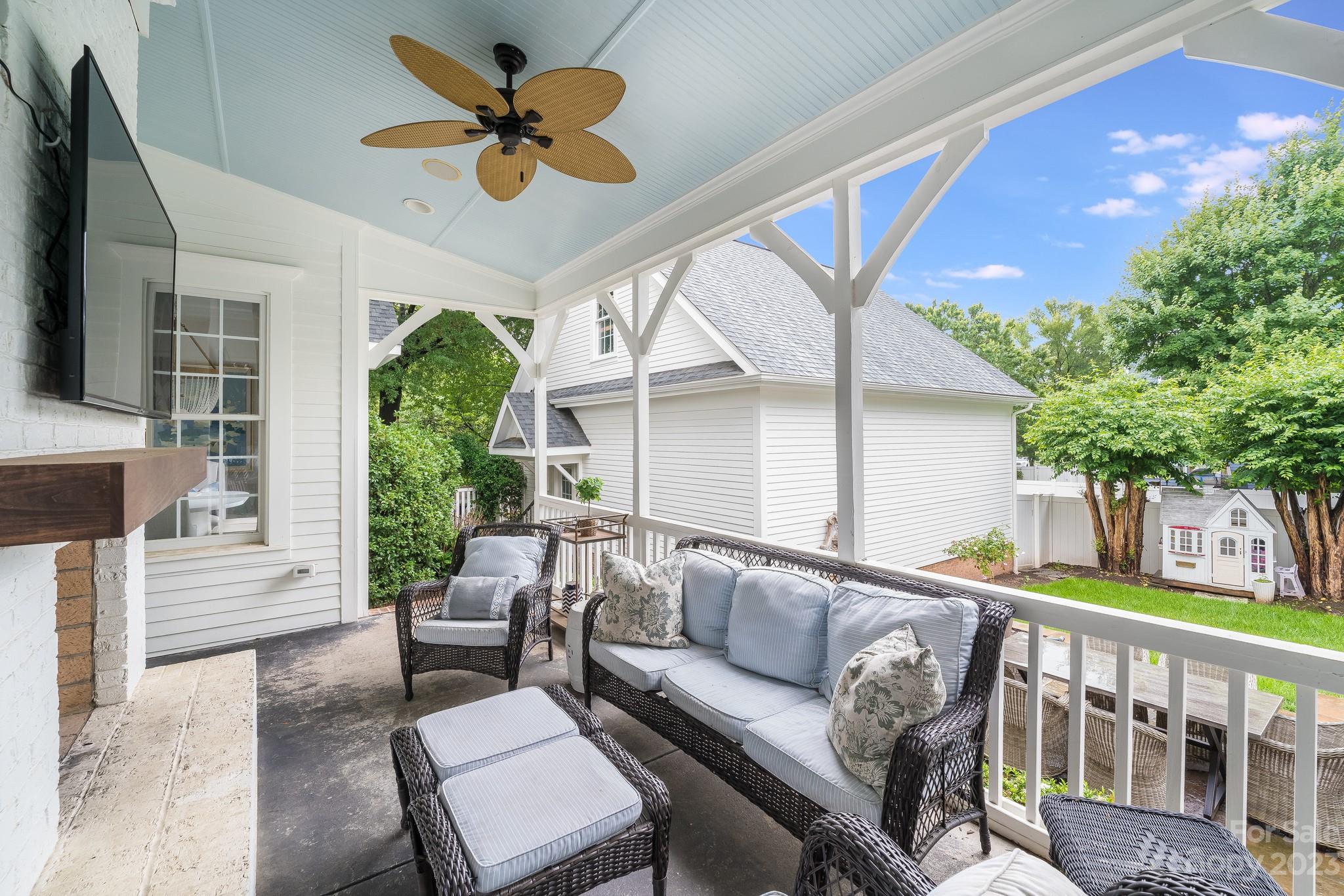 407 Bullfinch Bend Fort Mill, SC 29708 - Photo 42 of 46 a balcony with furniture and a potted plant