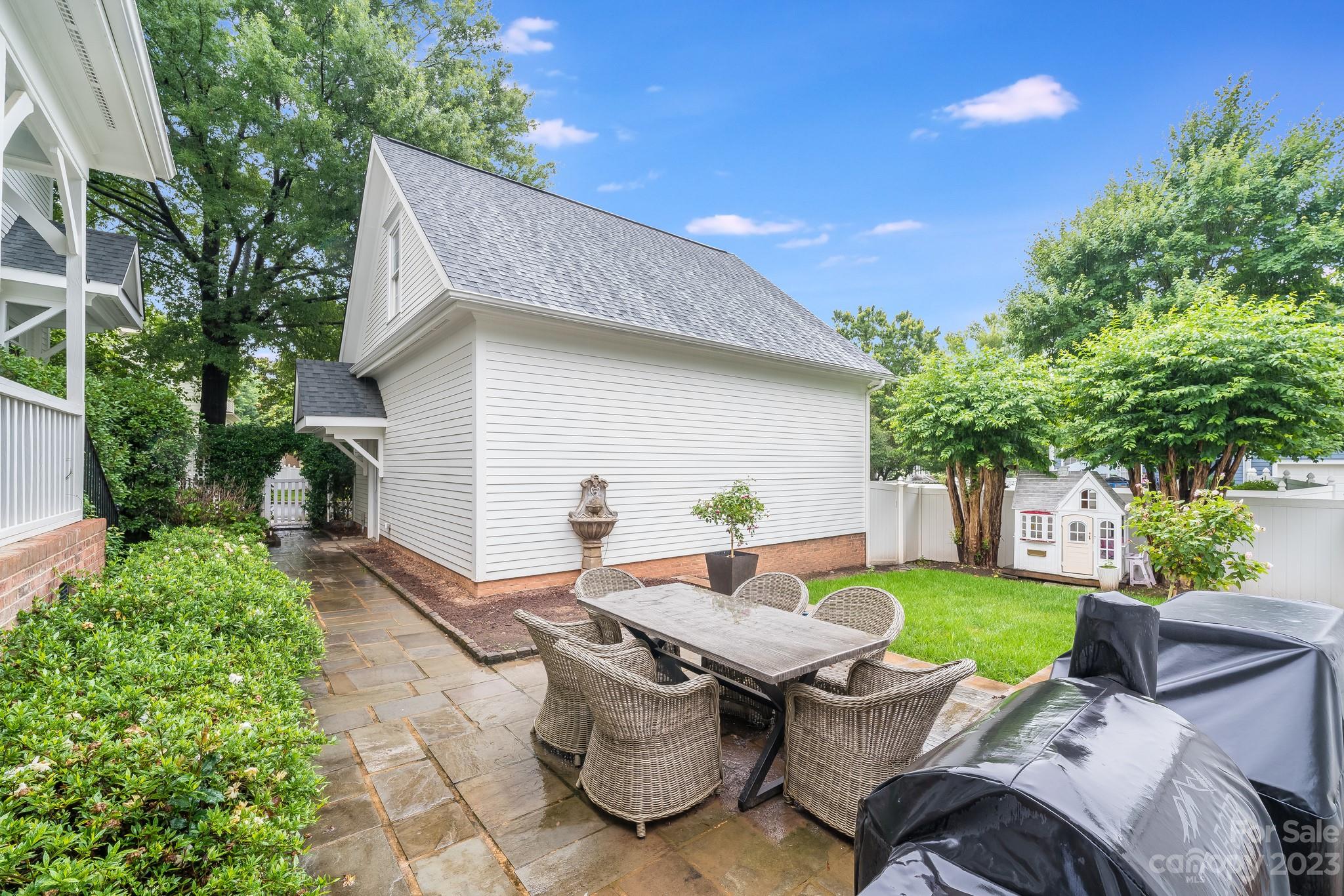 407 Bullfinch Bend Fort Mill, SC 29708 - Photo 44 of 46 a view of backyard of house with seating space