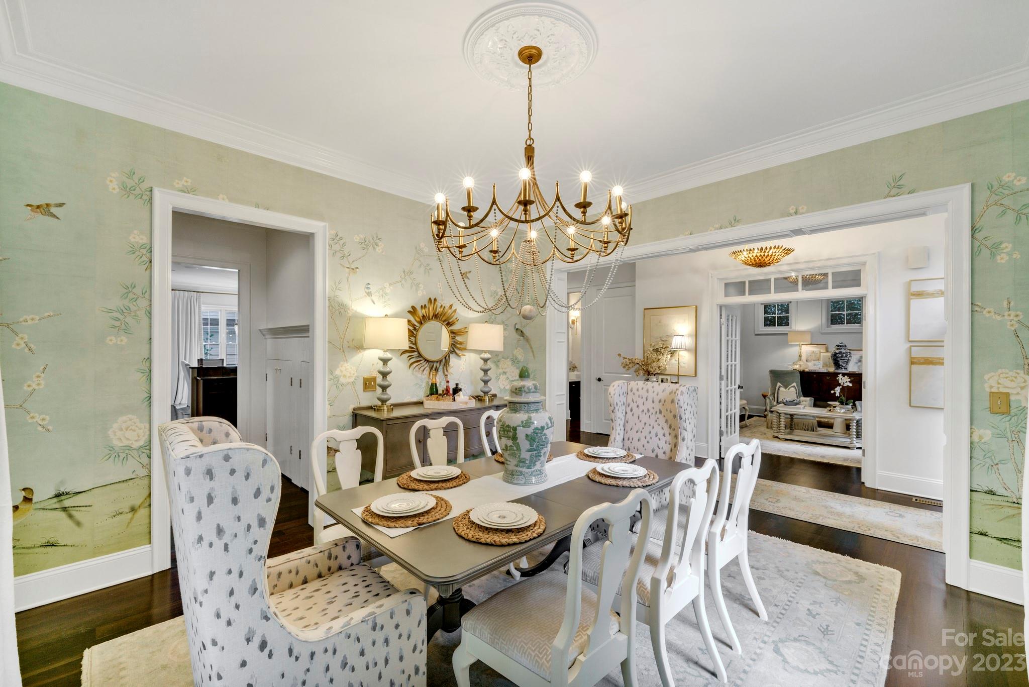 407 Bullfinch Bend Fort Mill, SC 29708 - Photo 5 of 46 a view of a dining room with furniture and chandelier