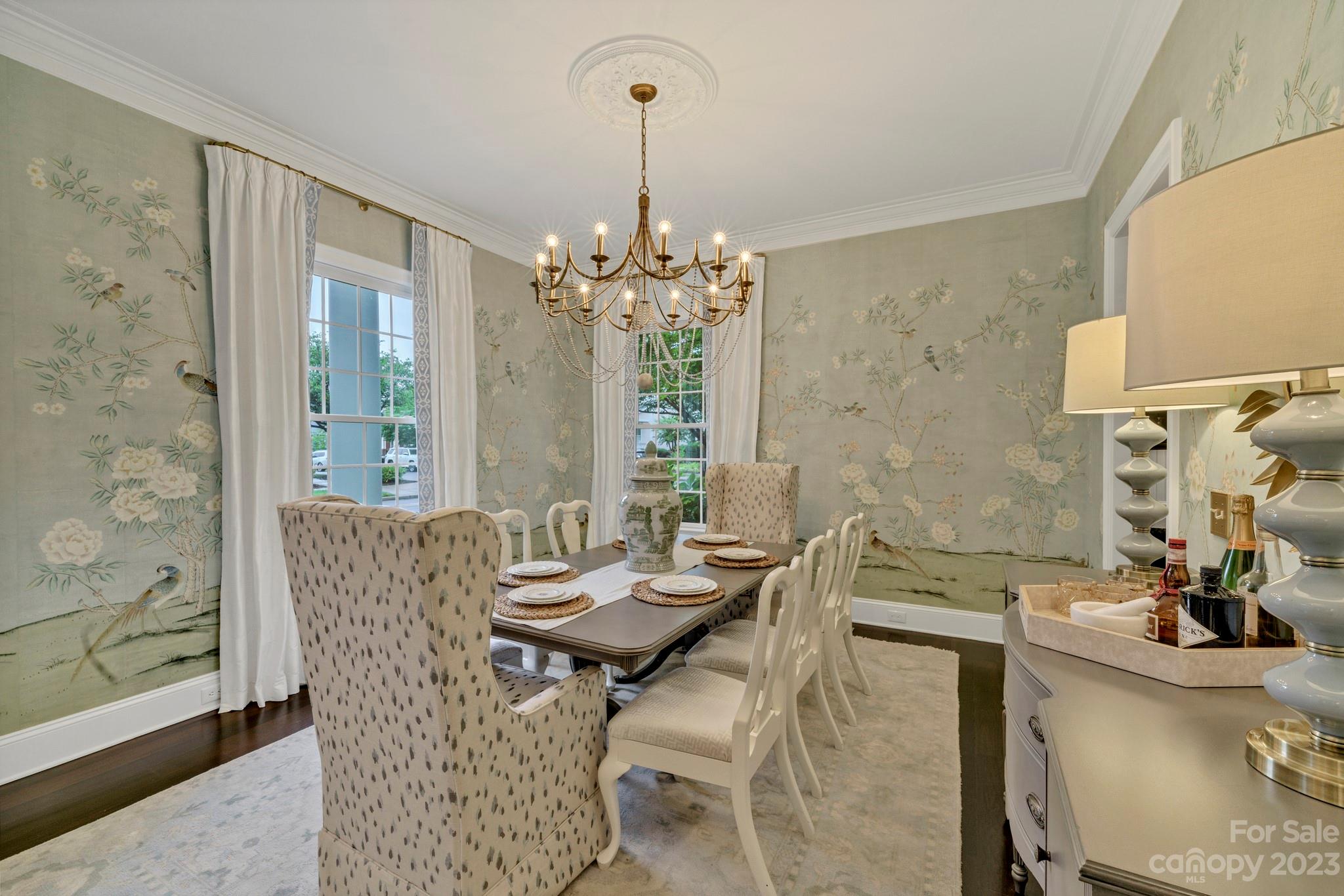 407 Bullfinch Bend Fort Mill, SC 29708 - Photo 6 of 46 a view of a dining room with furniture and chandelier
