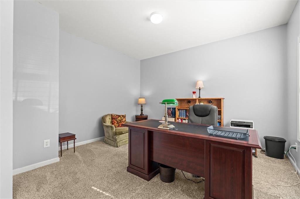130 Chadwick Place Villa Rica, GA 30180 - Photo 20 of 55 a workspace with furniture and lamp