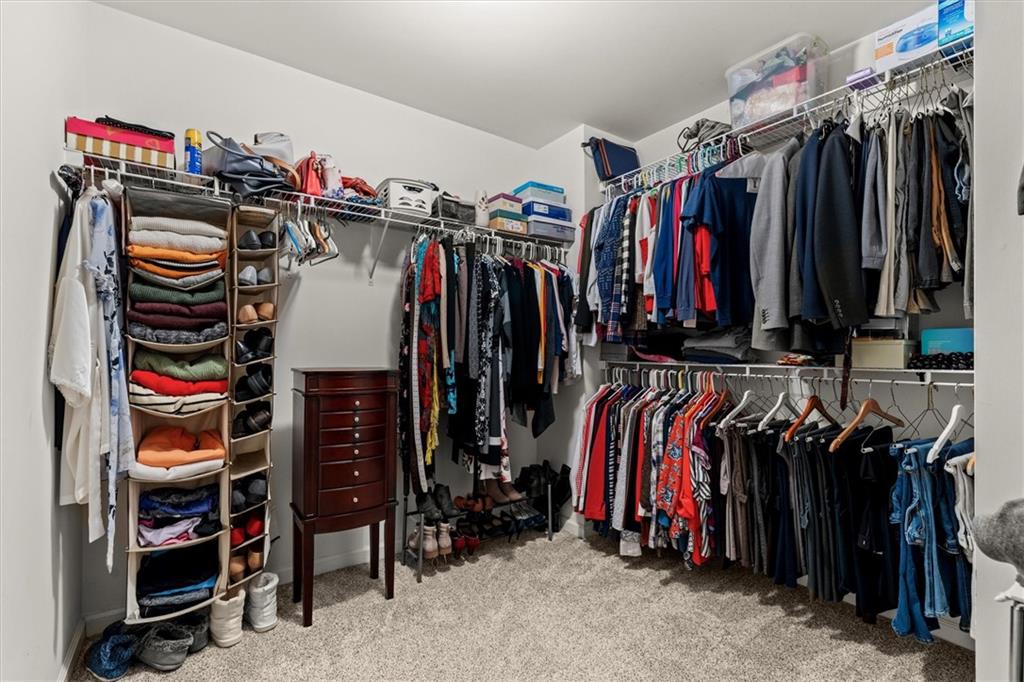 130 Chadwick Place Villa Rica, GA 30180 - Photo 29 of 55 a view of walk in closet with clothes