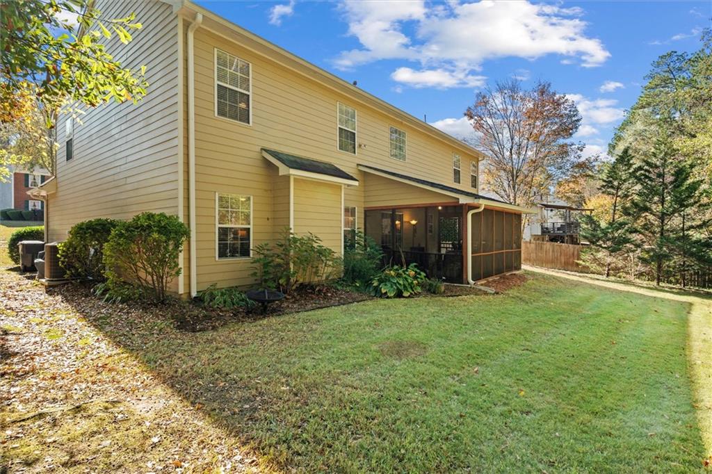 130 Chadwick Place Villa Rica, GA 30180 - Photo 44 of 55 a view of a house with backyard and garden