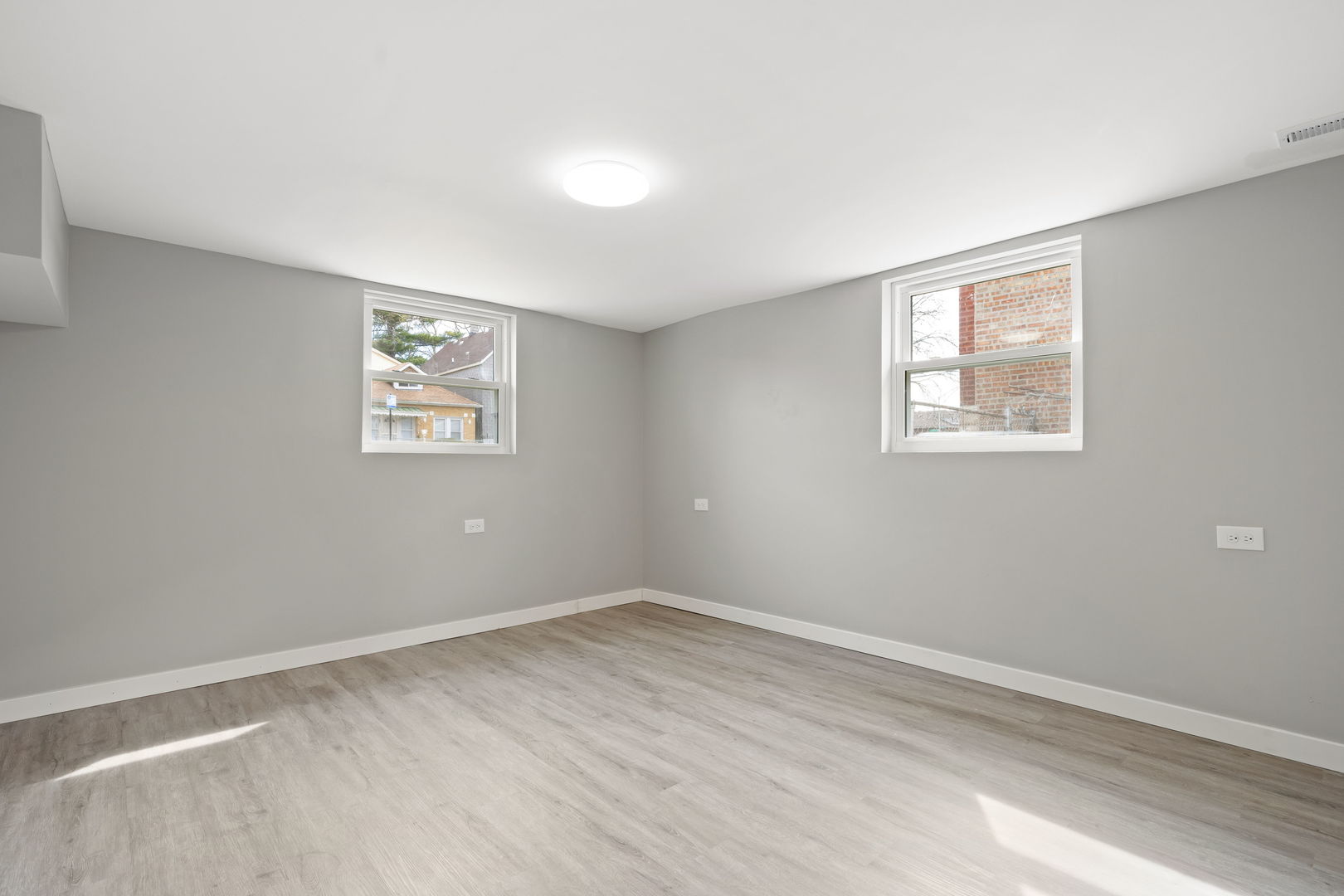 8048 South Avalon Avenue Chicago, IL 60619 - Photo 5 of 17 a view of a room that has a window in it