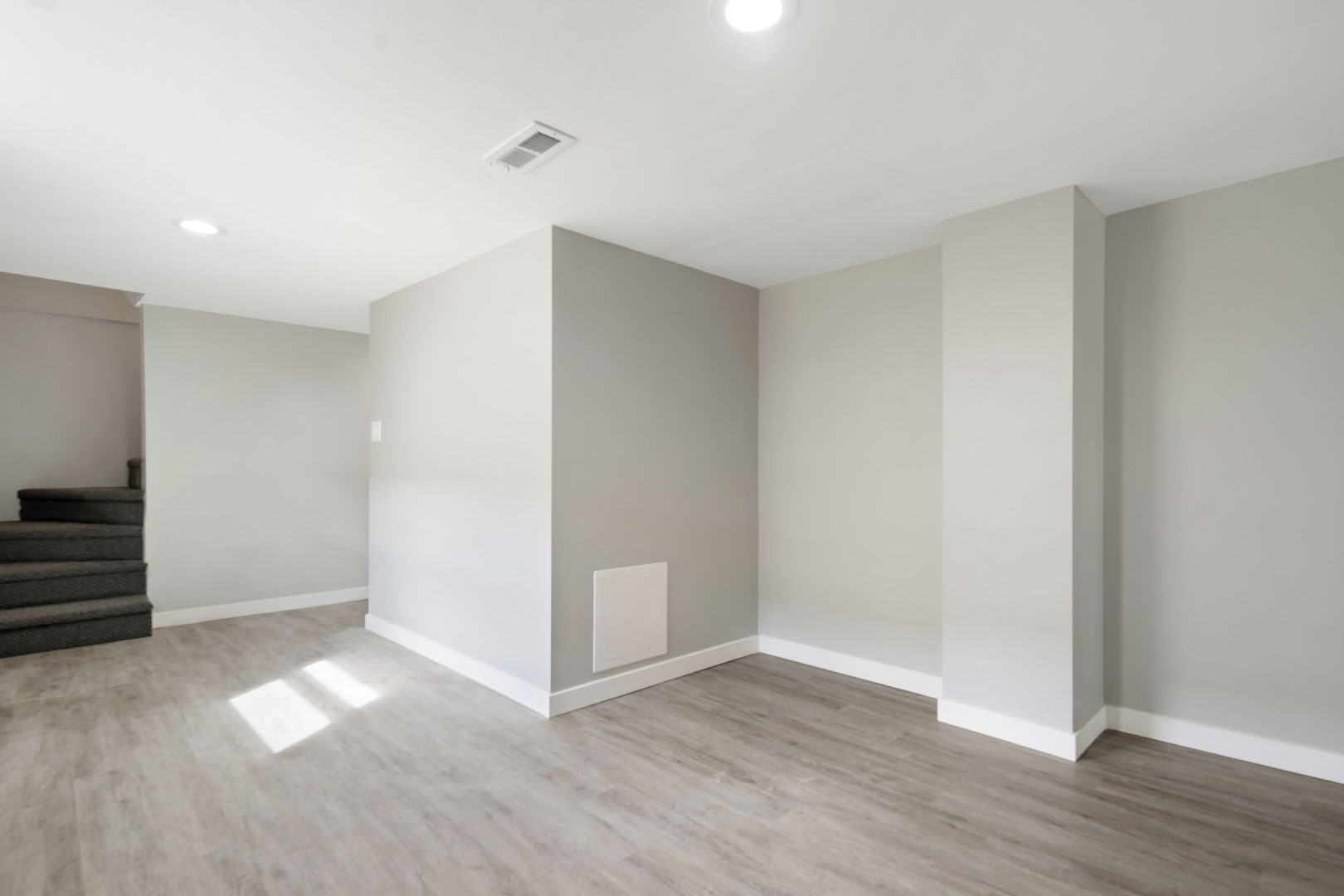 8048 South Avalon Avenue Chicago, IL 60619 - Photo 6 of 17 a view of empty room with wooden floor