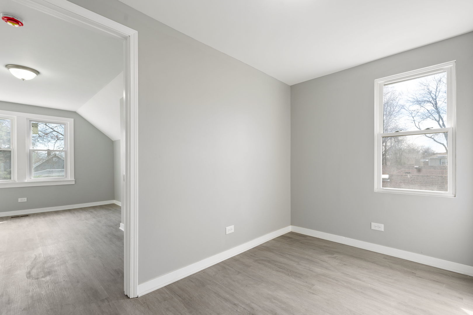 8048 South Avalon Avenue Chicago, IL 60619 - Photo 9 of 17 an empty room with windows