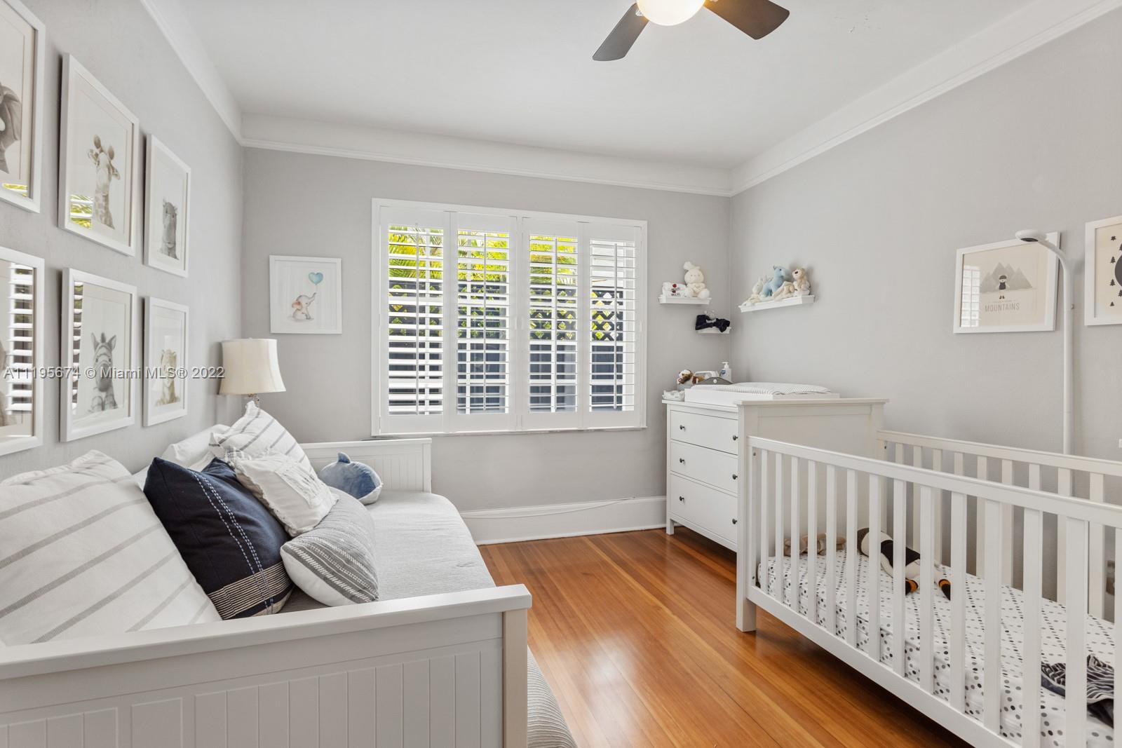 1860 Southwest 11th Street Miami, FL 33135 - Photo 15 of 30 a bed room with a bed and a window