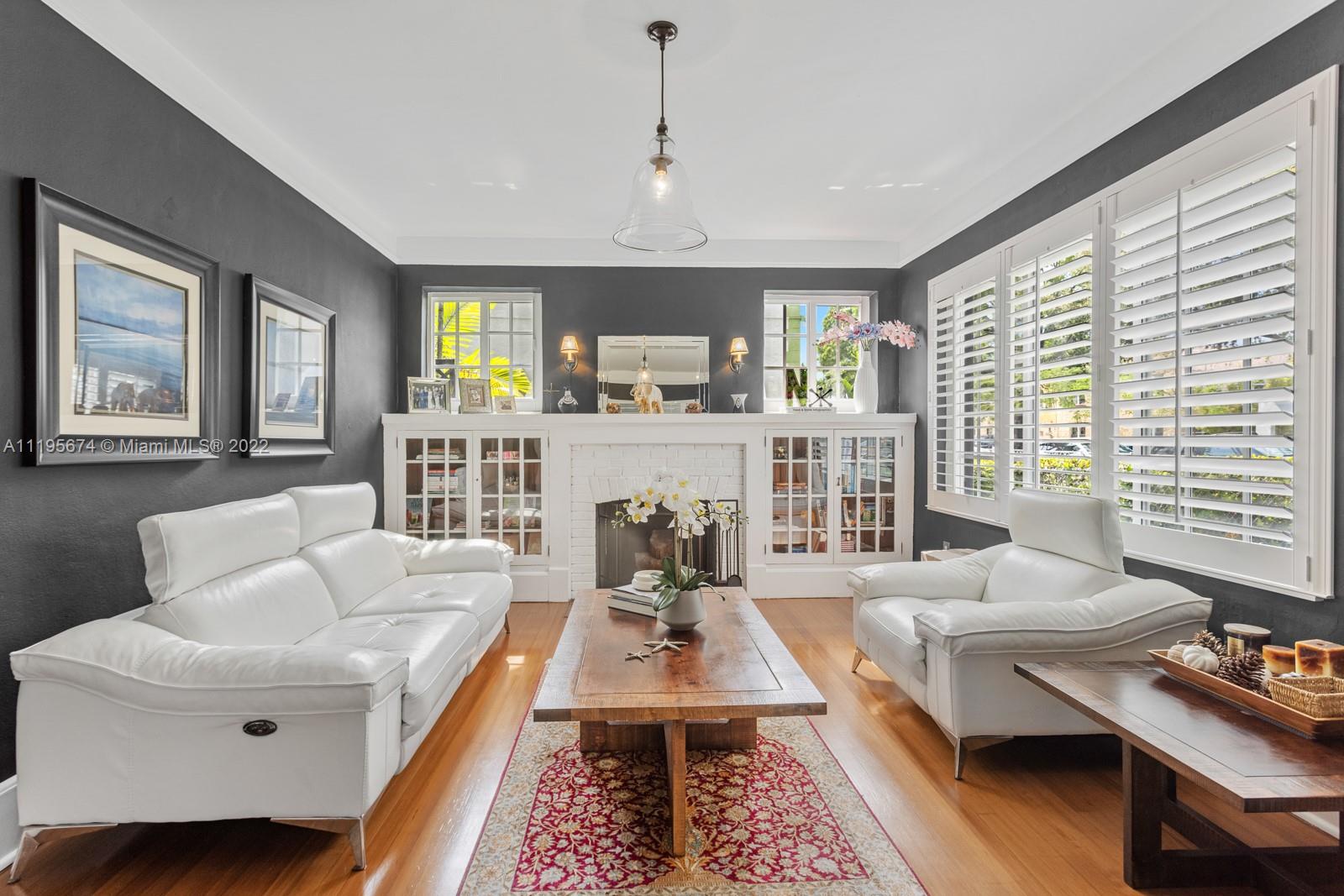 1860 Southwest 11th Street Miami, FL 33135 - Photo 4 of 30 a living room with furniture fireplace and a large window