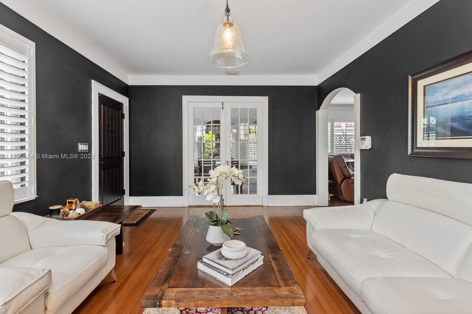 1860 Southwest 11th Street Miami, FL 33135 - Photo 8 of 30 a living room with furniture and a large window