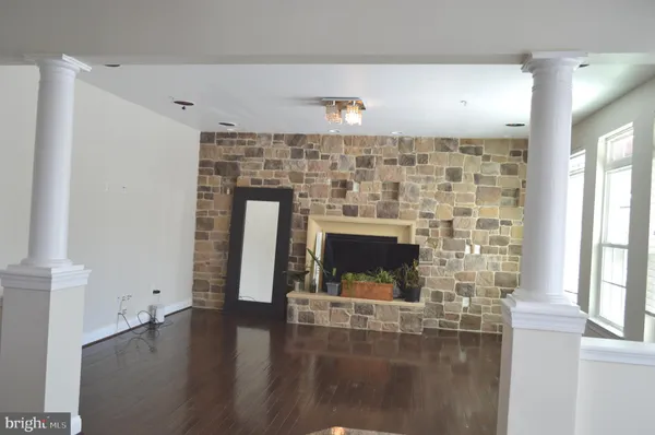 a living room with a fireplace
