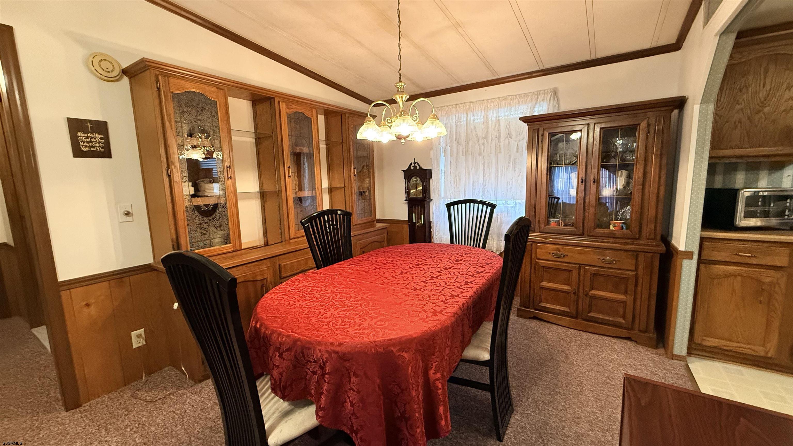 581 Miles Standish Lane Buena, NJ 08310 - Photo 12 of 32 a view of a dining room with furniture