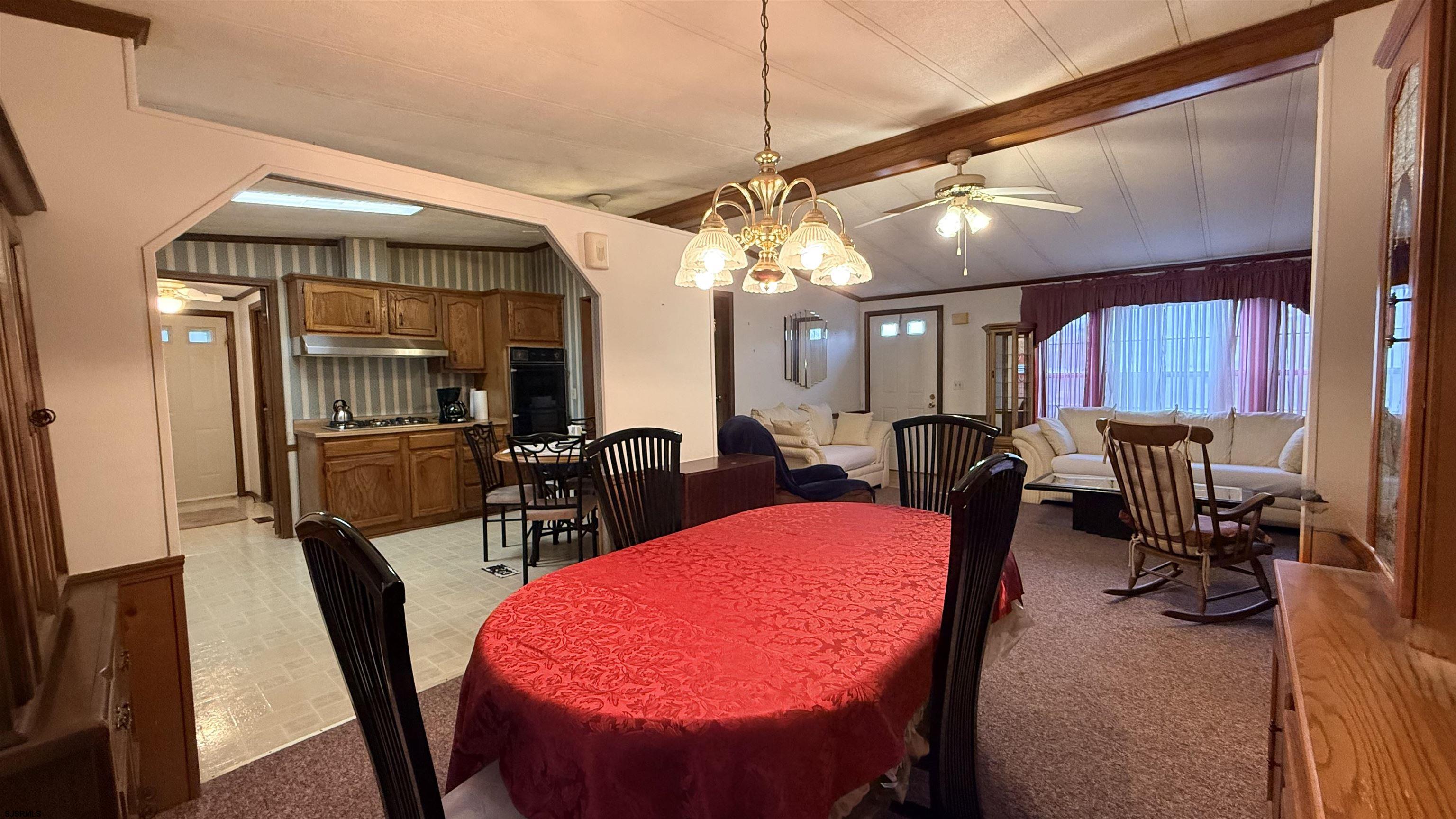 581 Miles Standish Lane Buena, NJ 08310 - Photo 13 of 32 a view of a dining room with furniture