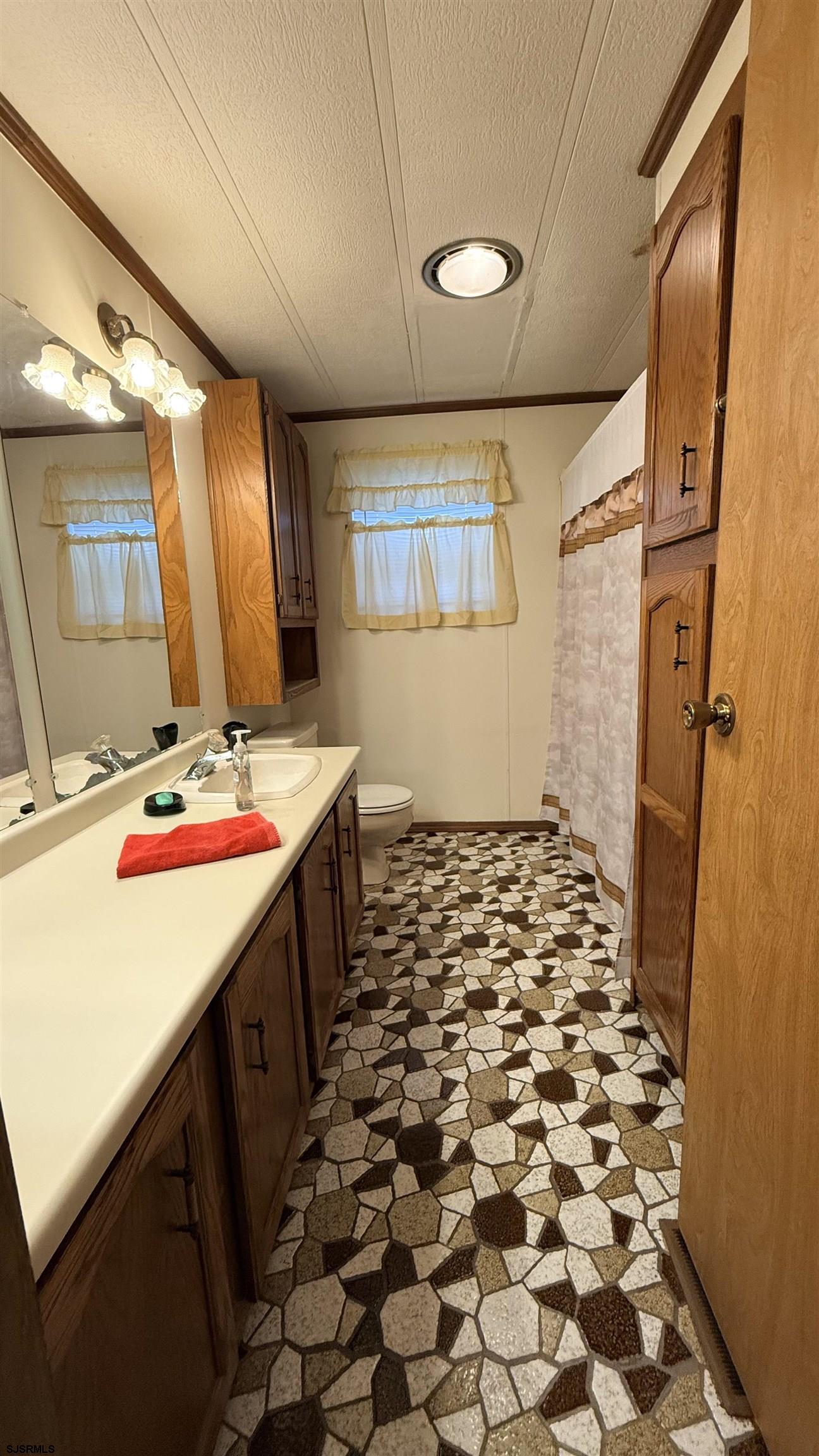 581 Miles Standish Lane Buena, NJ 08310 - Photo 18 of 32 a room with storage and utility