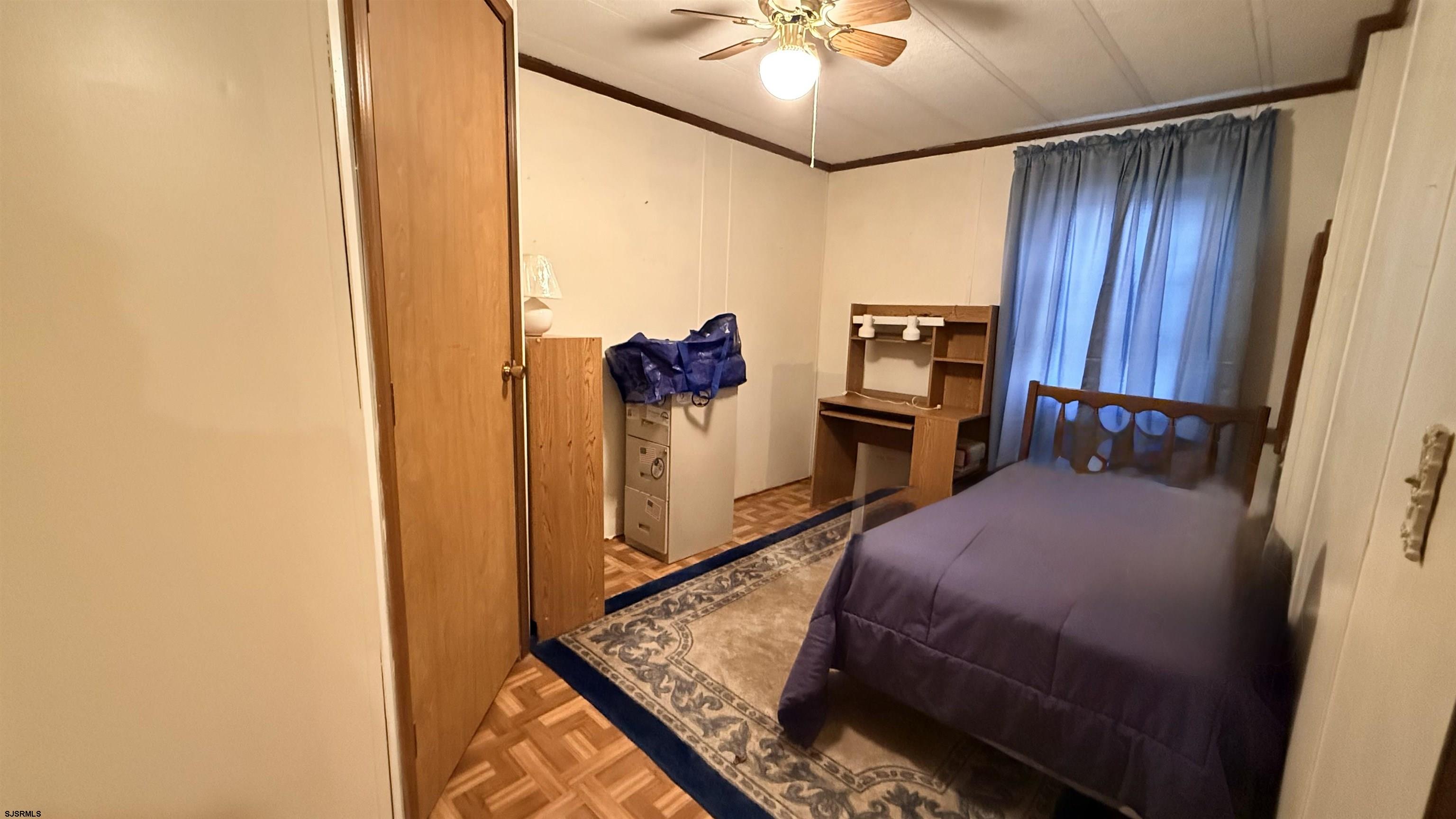 581 Miles Standish Lane Buena, NJ 08310 - Photo 19 of 32 a bed room with a bed and a television