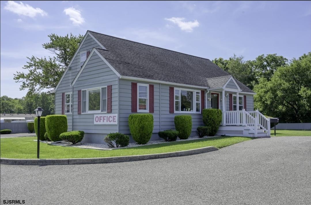581 Miles Standish Lane Buena, NJ 08310 - Photo 23 of 32 a front view of house with yard and green space