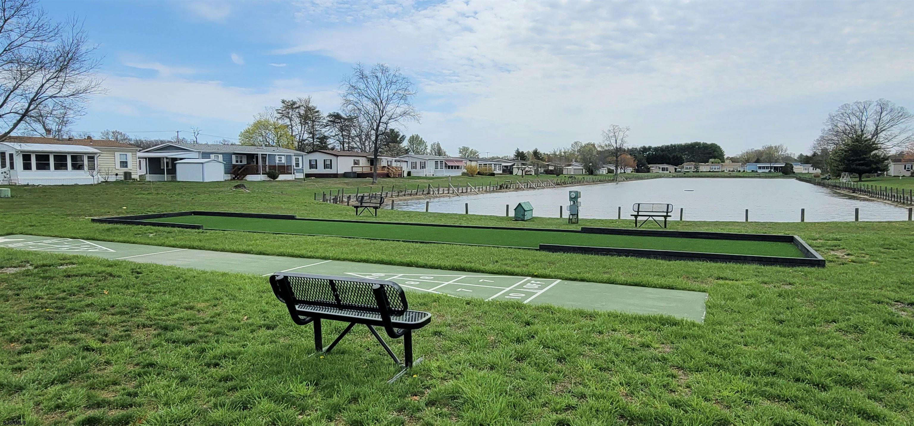 581 Miles Standish Lane Buena, NJ 08310 - Photo 27 of 32 a view of a big house with a big yard and potted plants