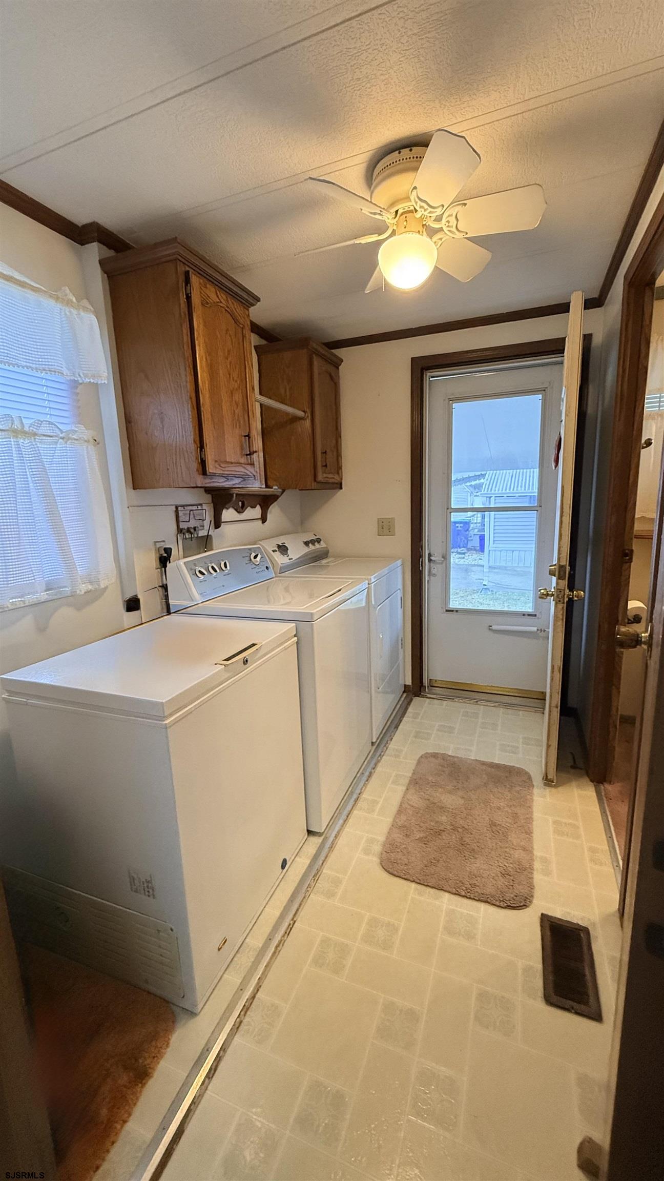 581 Miles Standish Lane Buena, NJ 08310 - Photo 3 of 32 a bathroom with a sink a toilet and mirror