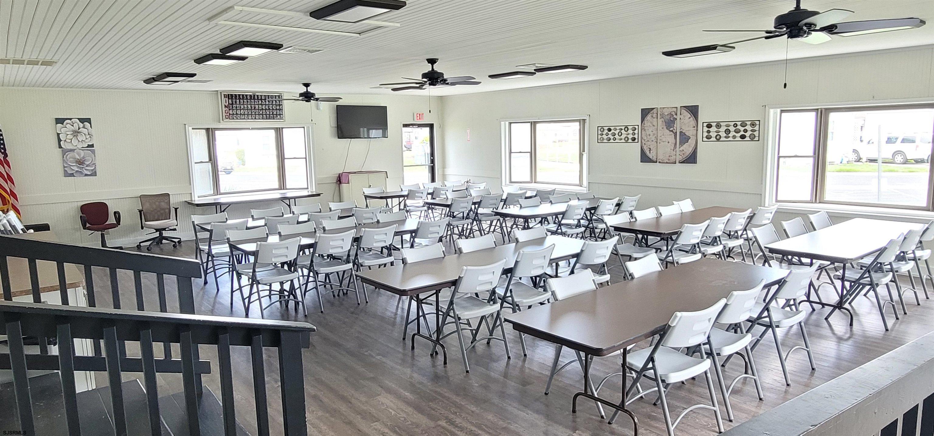 581 Miles Standish Lane Buena, NJ 08310 - Photo 32 of 32 a view of a dining room with furniture and wooden floor