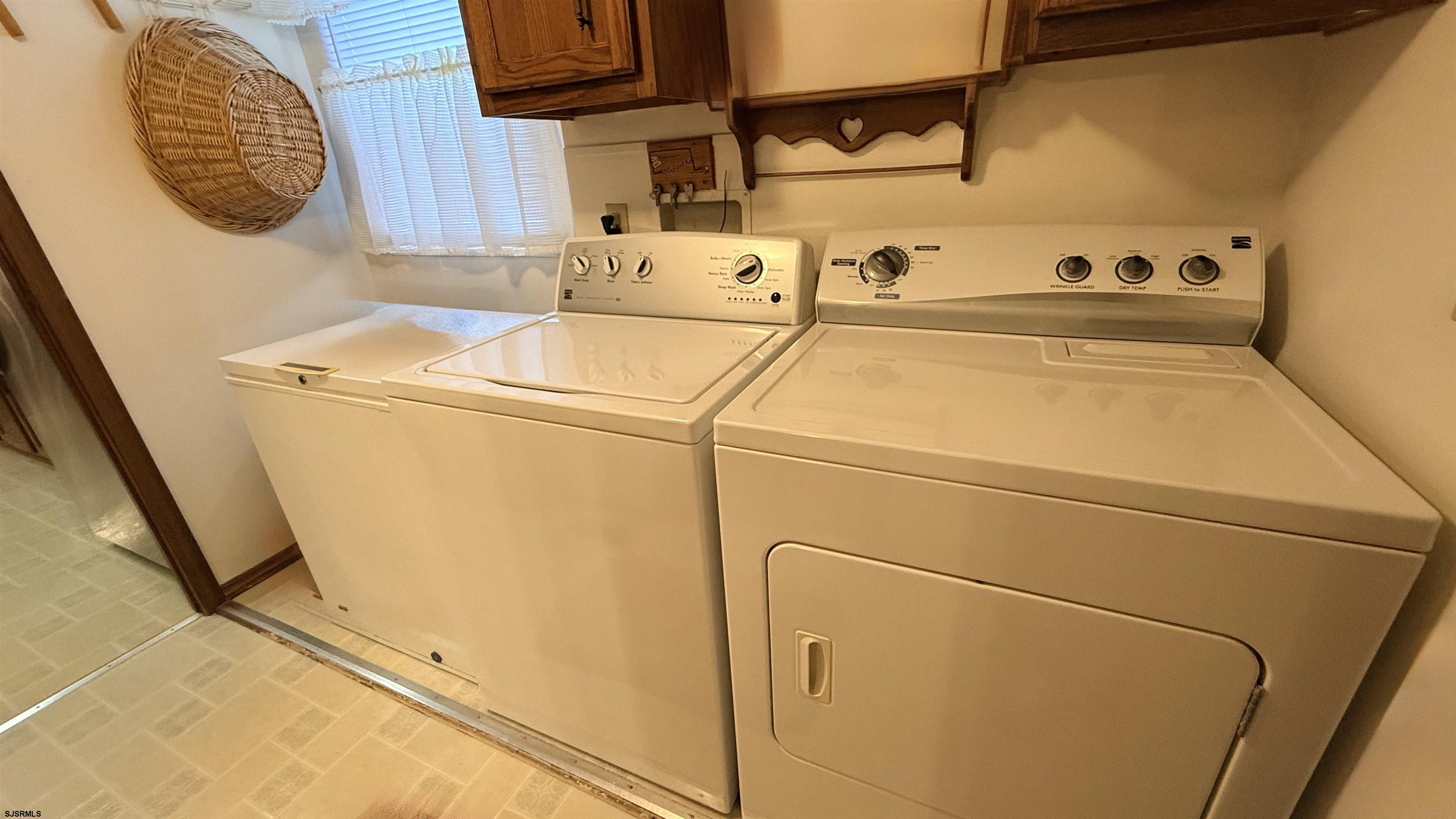 581 Miles Standish Lane Buena, NJ 08310 - Photo 4 of 32 a utility room with dryer and washer