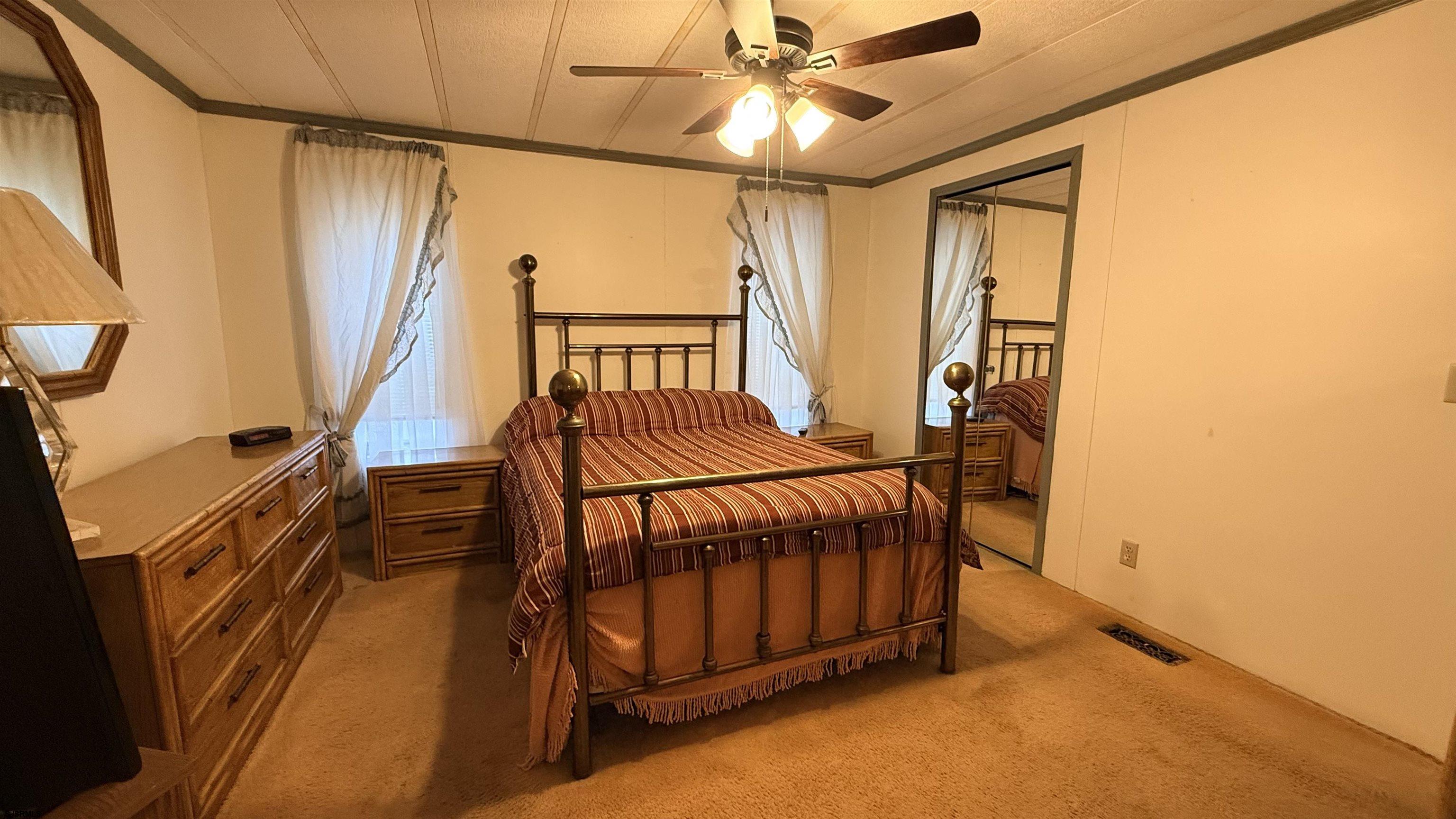 581 Miles Standish Lane Buena, NJ 08310 - Photo 8 of 32 a bedroom with furniture and a window