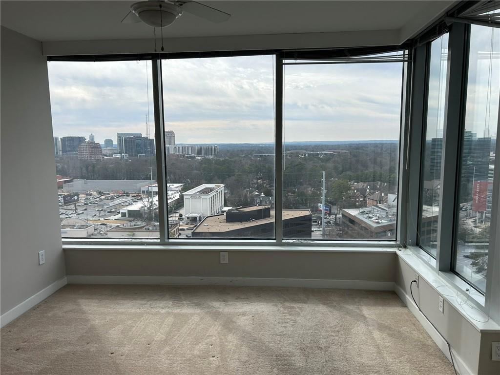 3338 Peachtree Road Northeast, Unit 2102 Atlanta, GA 30326 - Photo 13 of 14 a view of a room and window