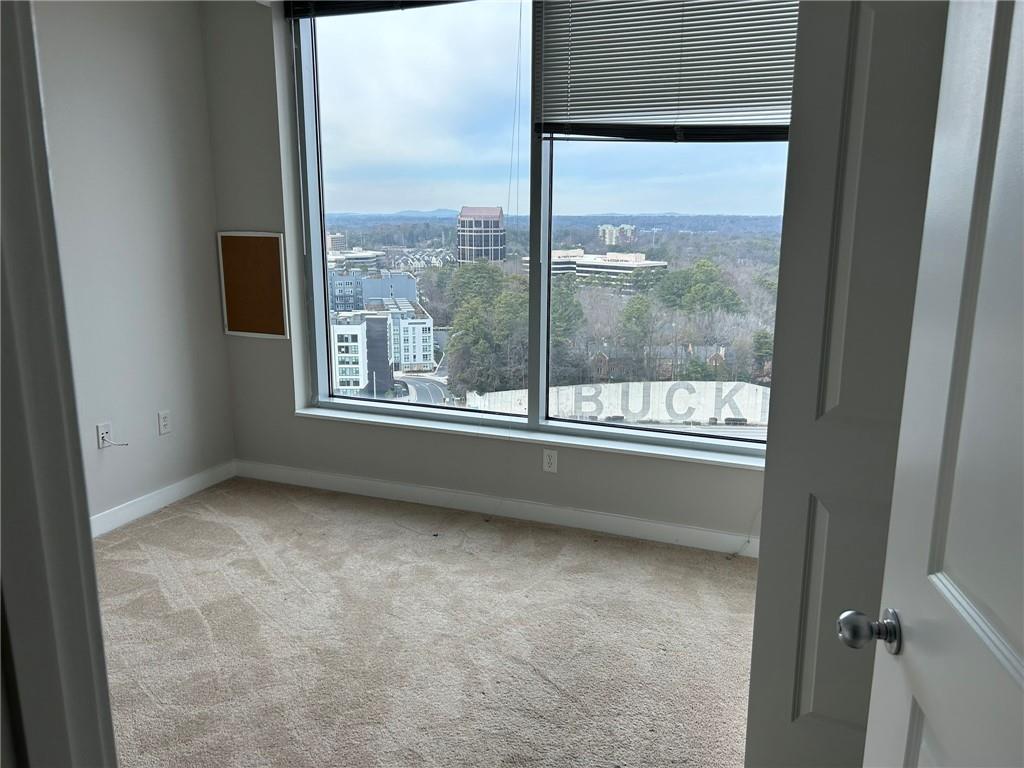 3338 Peachtree Road Northeast, Unit 2102 Atlanta, GA 30326 - Photo 7 of 14 a view of room with window