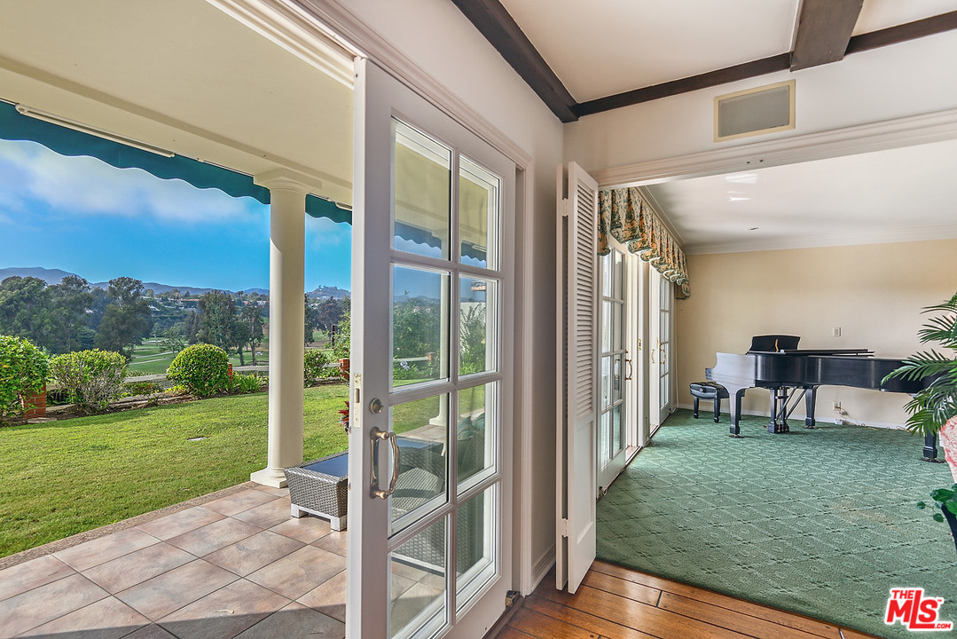 10 Gale Place Santa Monica, CA 90402 - Photo 19 of 46 a view of a porch with chairs and backyard