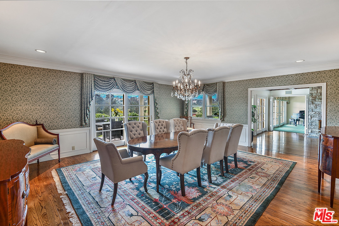 10 Gale Place Santa Monica, CA 90402 - Photo 28 of 46 a view of a dining room with furniture wooden floor and chandelier