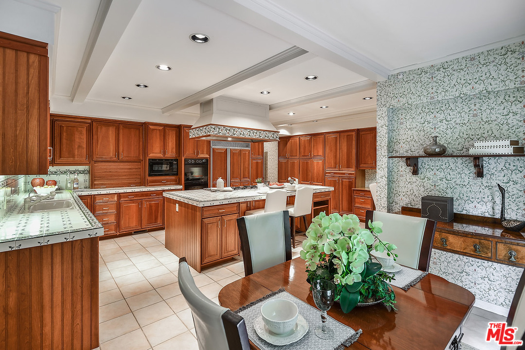 10 Gale Place Santa Monica, CA 90402 - Photo 29 of 46 a kitchen with granite countertop lots of counter top space a sink a window and appliances