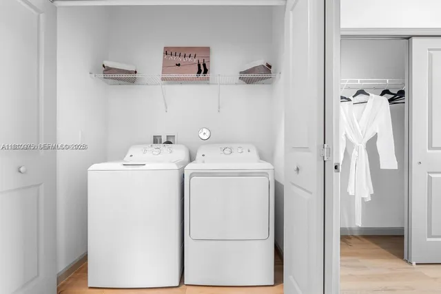 a utility room with dryer and washer
