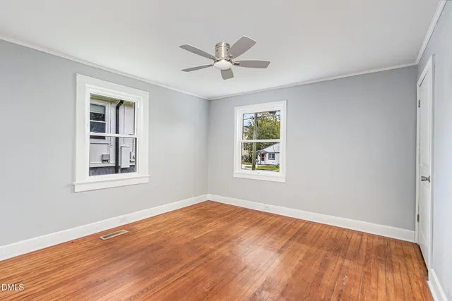 a bathroom with a sink a bathtub and a window