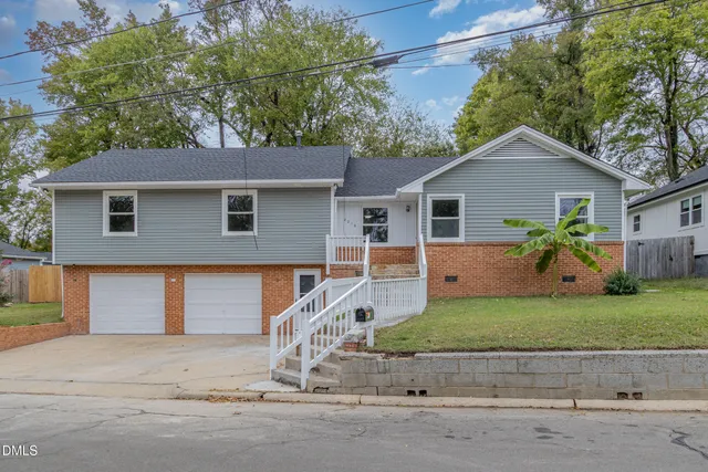 a picture of a bench in front of a wall
