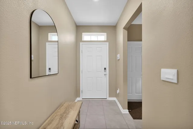 a view of a hallway with entryway