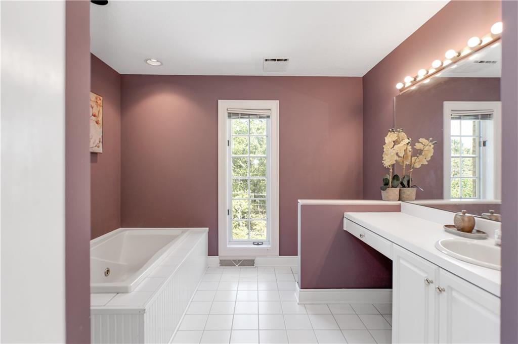 100 Burry Road Bradford Woods, PA 15015 - Photo 20 of 25 a bathroom with a sink a bathtub and a mirror