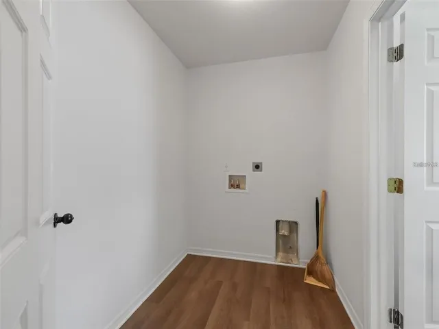 a view of small space with wooden floor