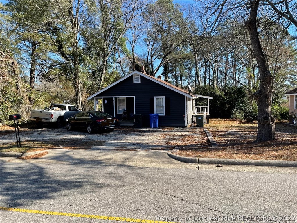 1215-1219 Camden Road Fayetteville, NC 28306 - Photo 2 of 25 a front view of a house with a yard
